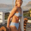 Model wearing Sasha underwire balconette bikini top and Rico high waist bottom in Puffy Seashell
