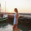 Tiana modest swim dress in Puffy Seashell Ocean with high neckline, fitted silhouette and raised seashell texture.